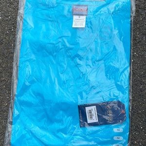Brand new Cherokee scrub top. Size Medium